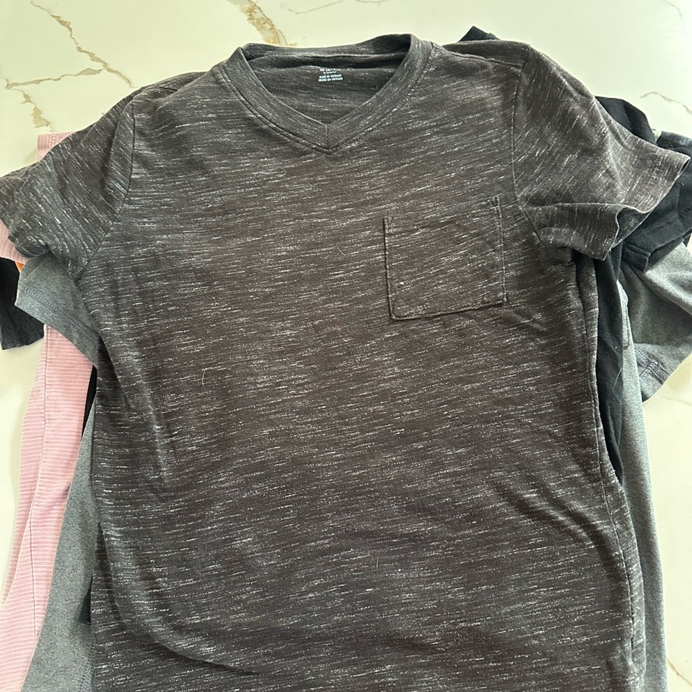 6 T-shirt lot, Sizes youth large and med.